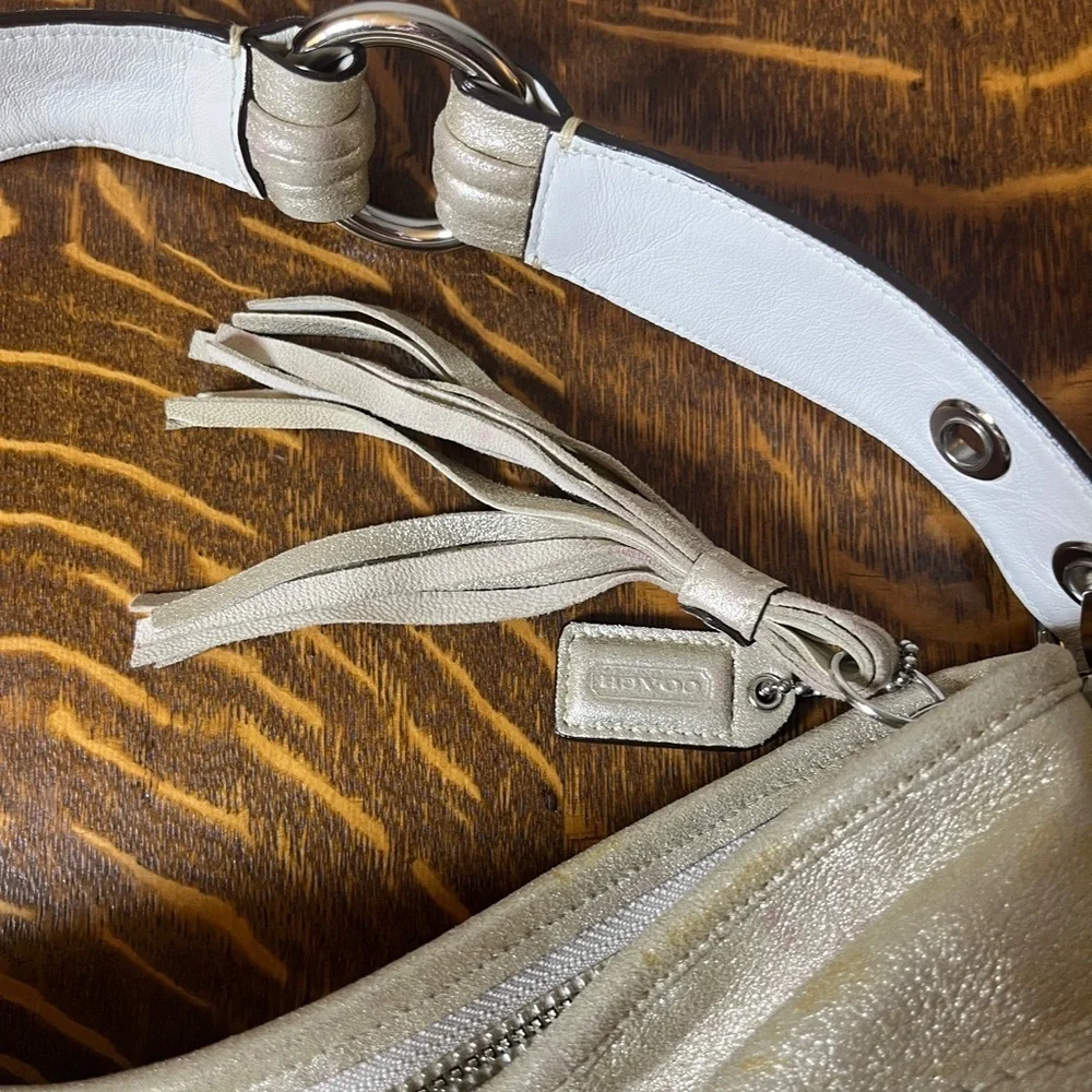 Coach Gold GOAT Leather Hobo Bag with gold tassel